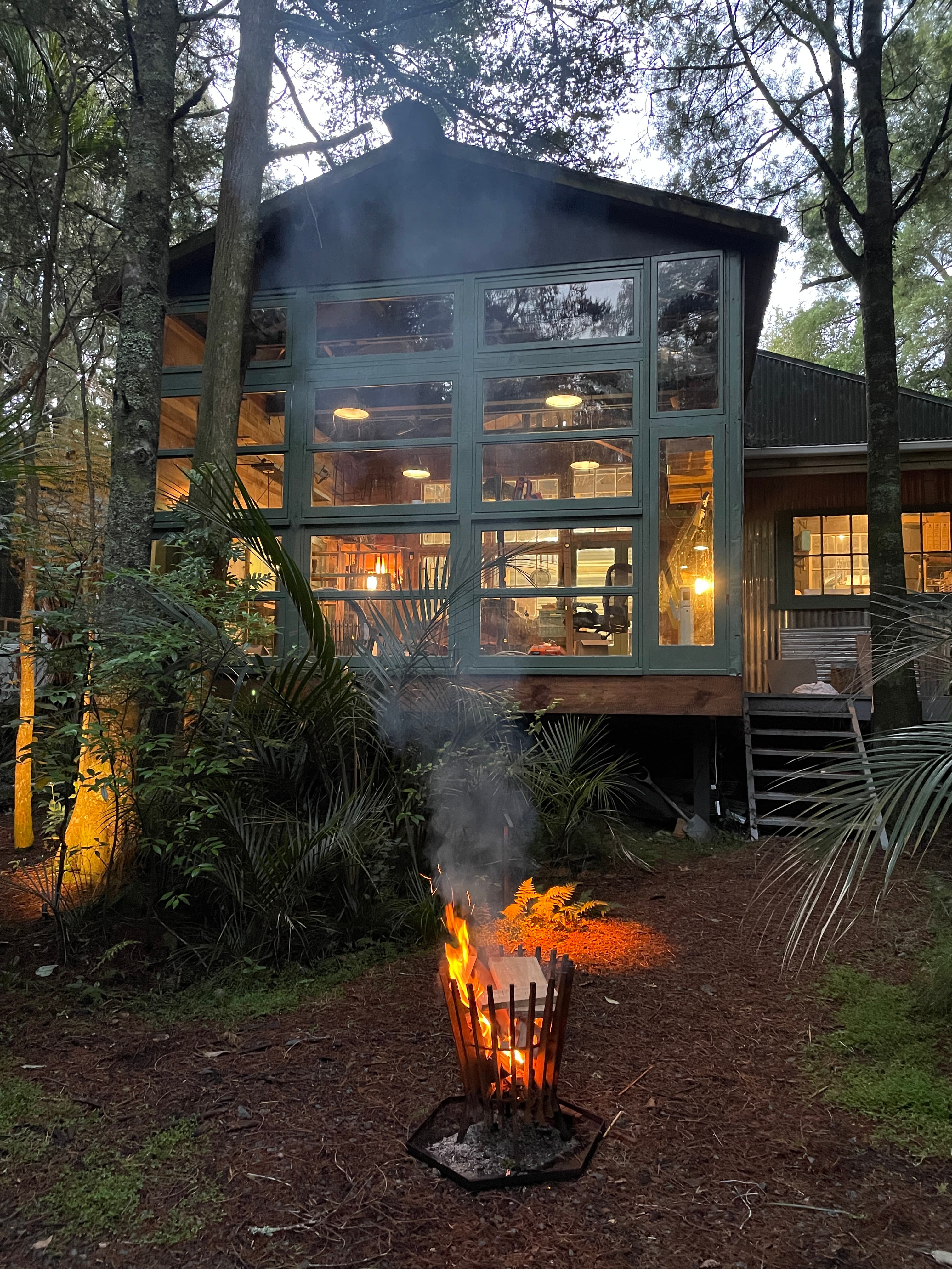 The illuminated SYML studio at dusk